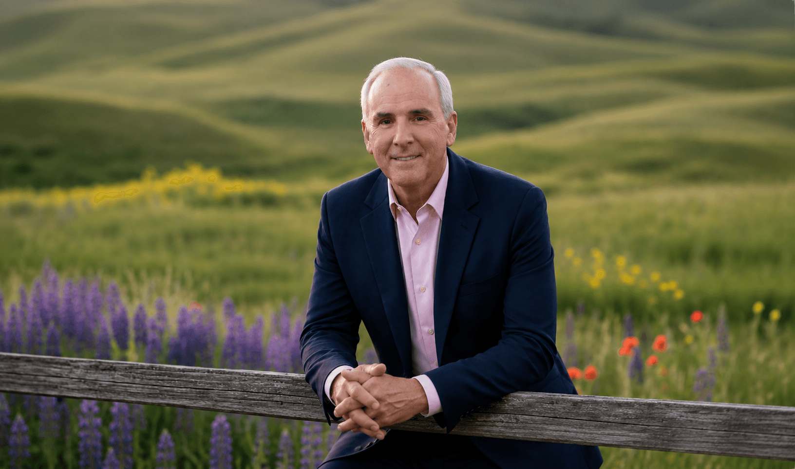 Tom Claycomb at a Kentucky pasture fence — owner-financed land across KY, TN, IN